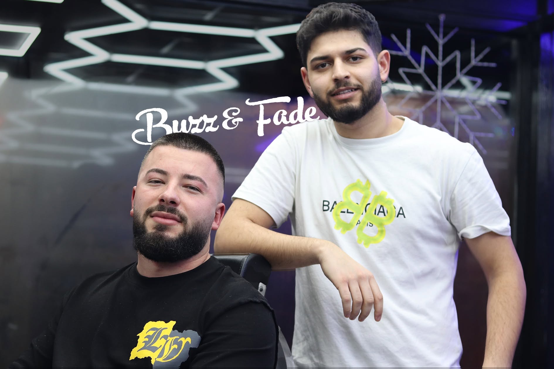 Mancho with a client at Buzz & Fade